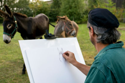 sketching and drawing a horse outside