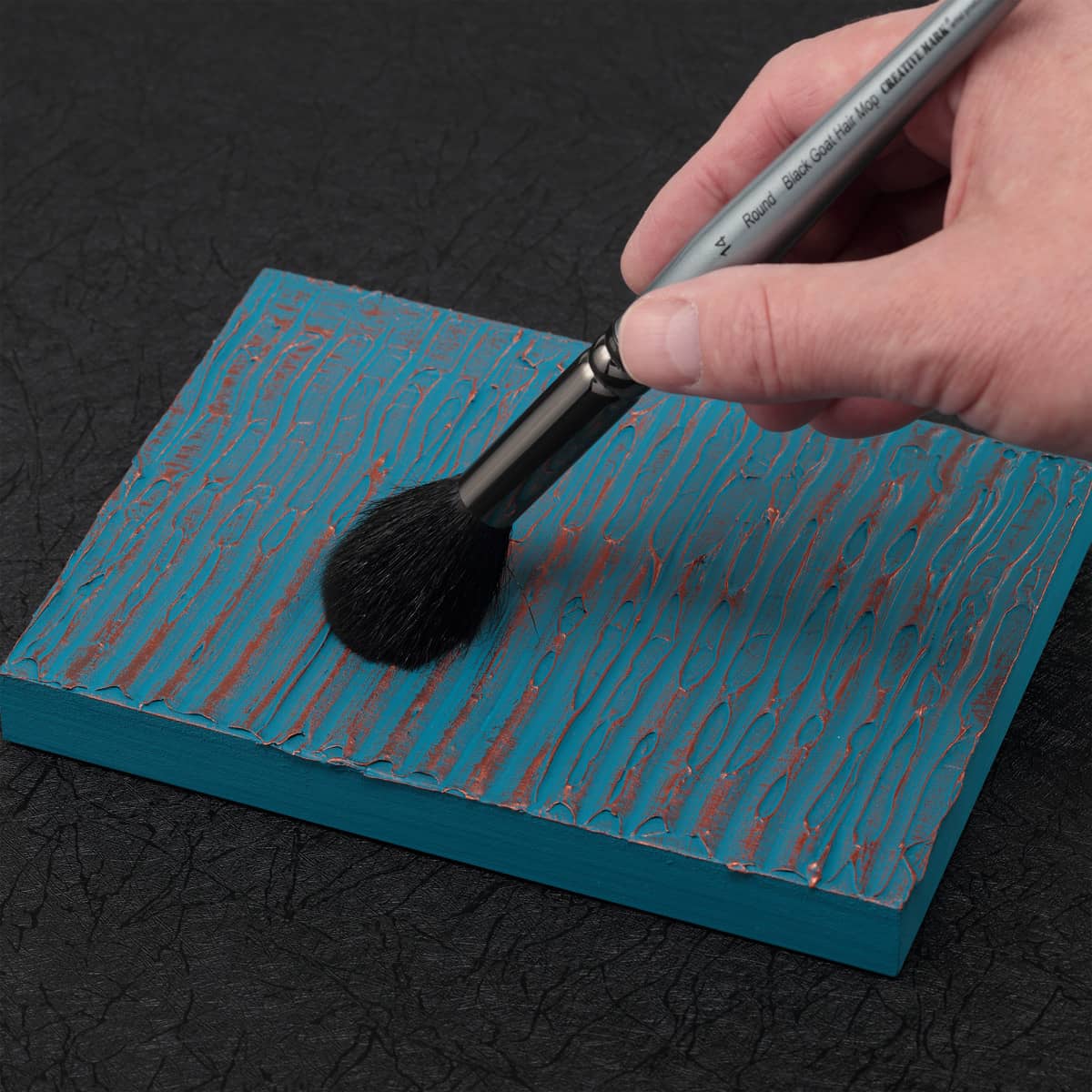 Creative Mark Black Goat Hair Mop Brush in use