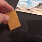Erase dried rubber cement or masking fluid