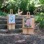 Canvas holder locks securely in place to carry wet canvases