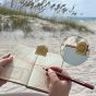 Durable brass clip keeps your sketch papers in place on windy days