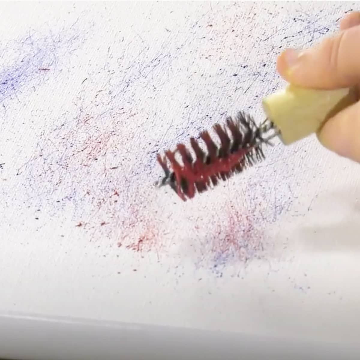 Turn metal handle and create a whole galaxy of paint drop spatters 