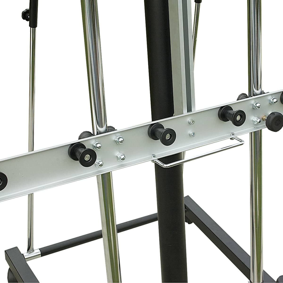 Move canvas horizontally on Delrin roller wheels strategically positioned on canvas holders