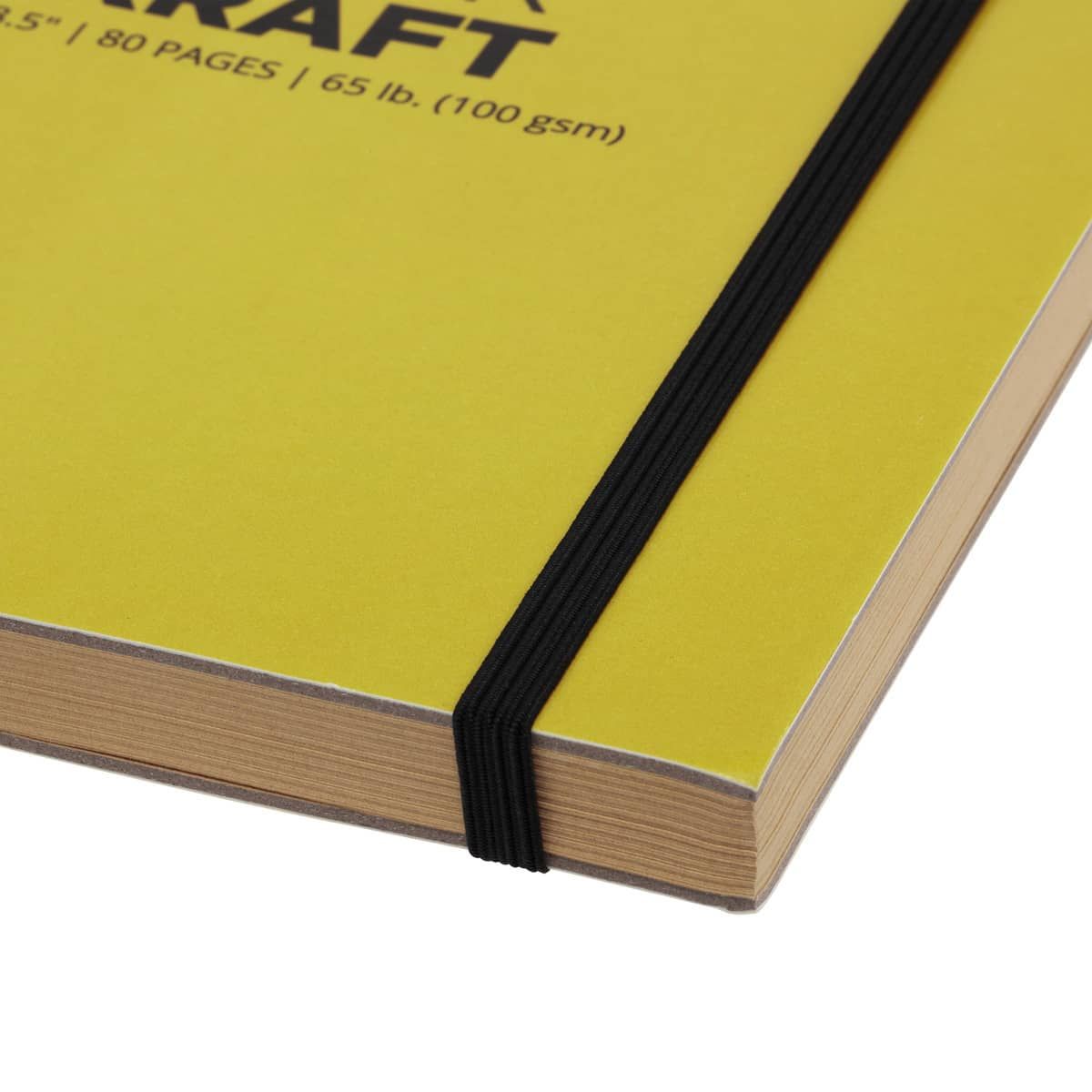 Elastic band holds journal closed for travel